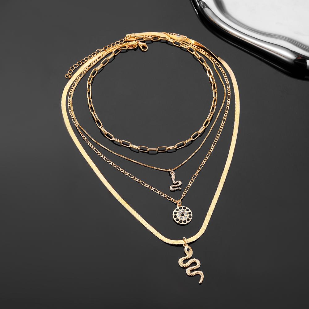 Four Piece Snake Necklace Women's Fashion Hollow Out Necklace Personality Bohemian Sweater Chain Elegant Snake Pendant