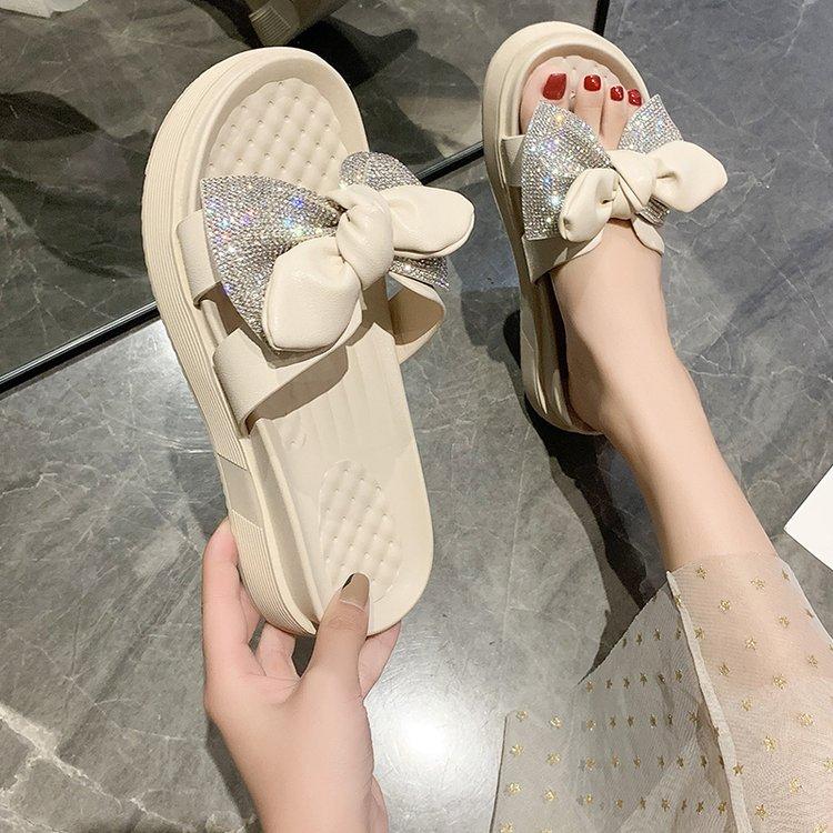 

Тапочки уличные 2024 новая летняя мода уличная одежда толстая подошва пляжные сланцы с бантом фея маффин подошва 40