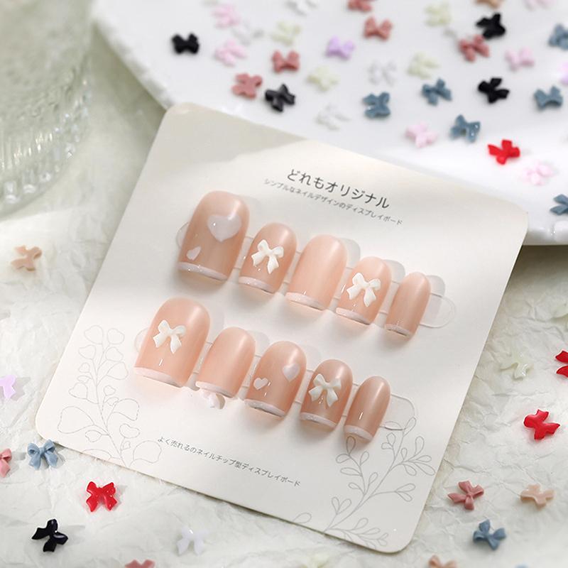 50Pcs Bow Resin Nail Art Decoration 3D Cream Color Bowknot Nail Charm Ornament Jewelry Diy Manicure Classic Accessory