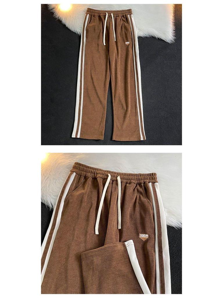 Męskie spodnie dresowe w paski w stylu retro: Luźne, amerykańskie spodnie z szerokimi nogawkami, proste i dopasowane, idealne na jesień