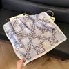 Simulated silk women's small square scarf, Korean cashew nut leopard print small silk scarf, headscarf, four-season scarf, professional scarf.