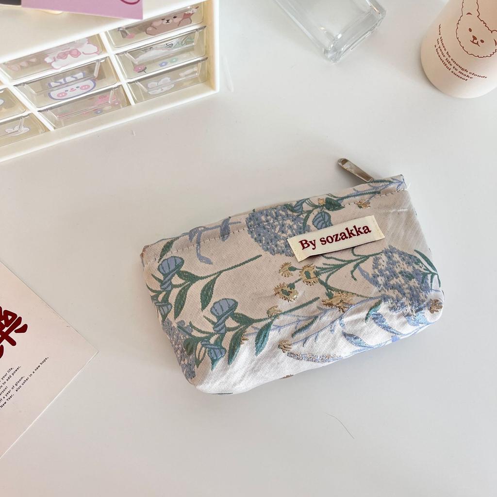 Trendy Ladies Simple And Portable Floral Embossed Cosmetic Bag For Use Everyday