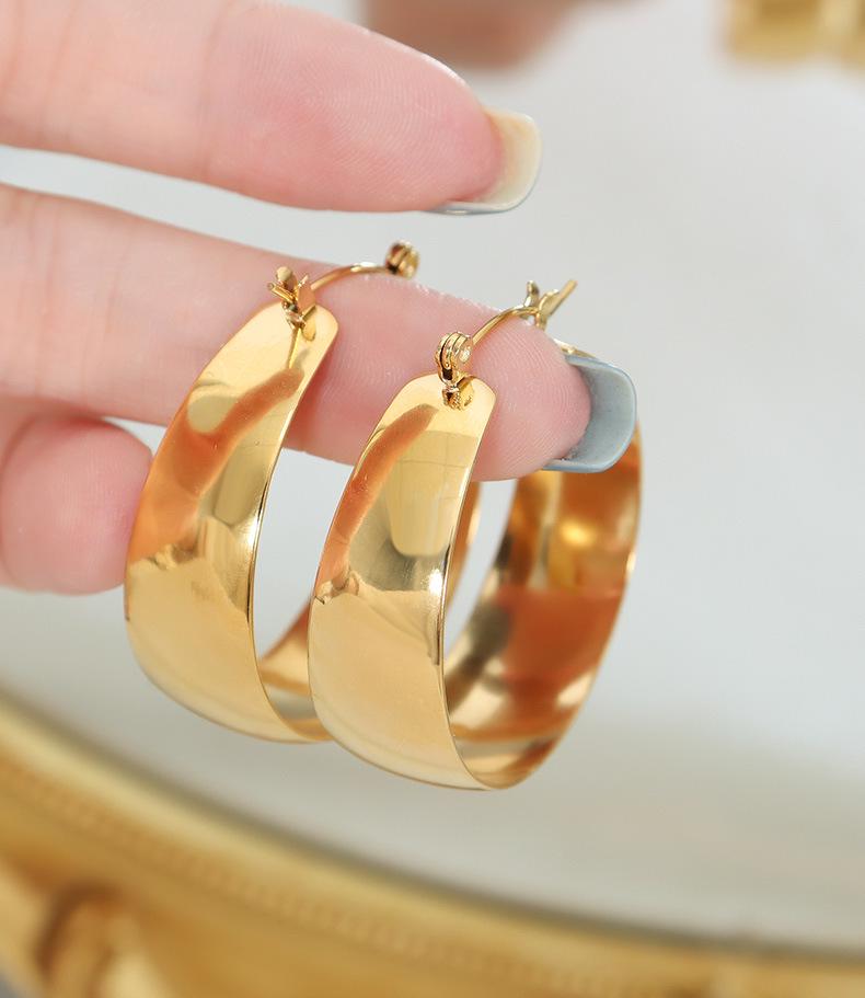 European-American Vintage Asymmetrical Round Titanium Steel Earrings for Women
