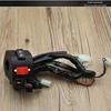 Motorcycle Handlebar Switch Assembly for Dayang DY100: Turn Signal, Headlight, and Horn Controls.