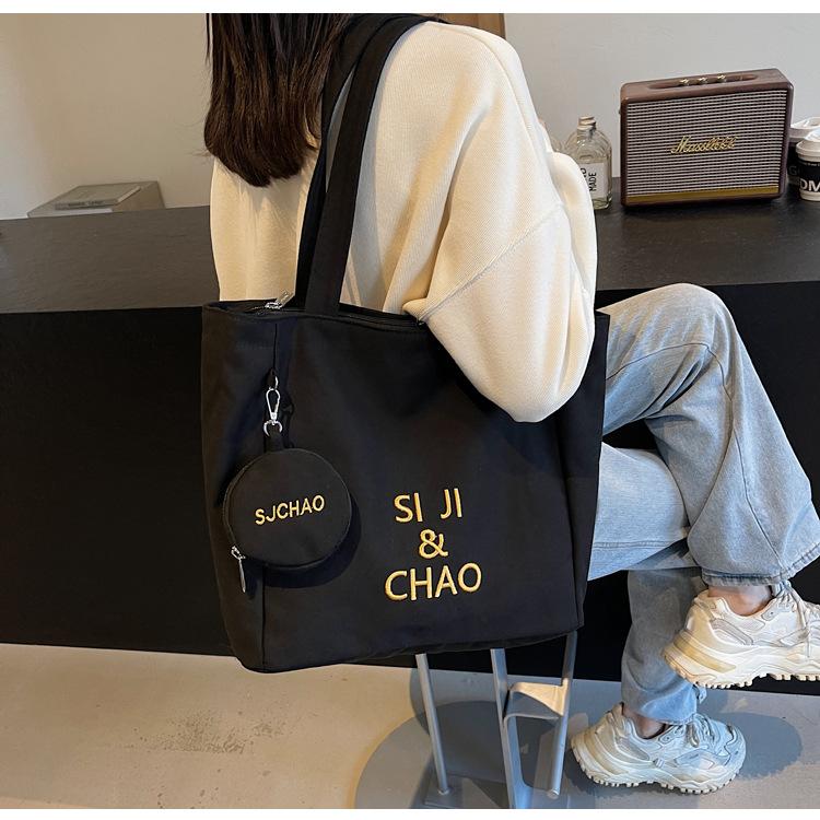 Women's Large-capacity Canvas Bag, Simple Letters, Versatile Commuting Artifact.