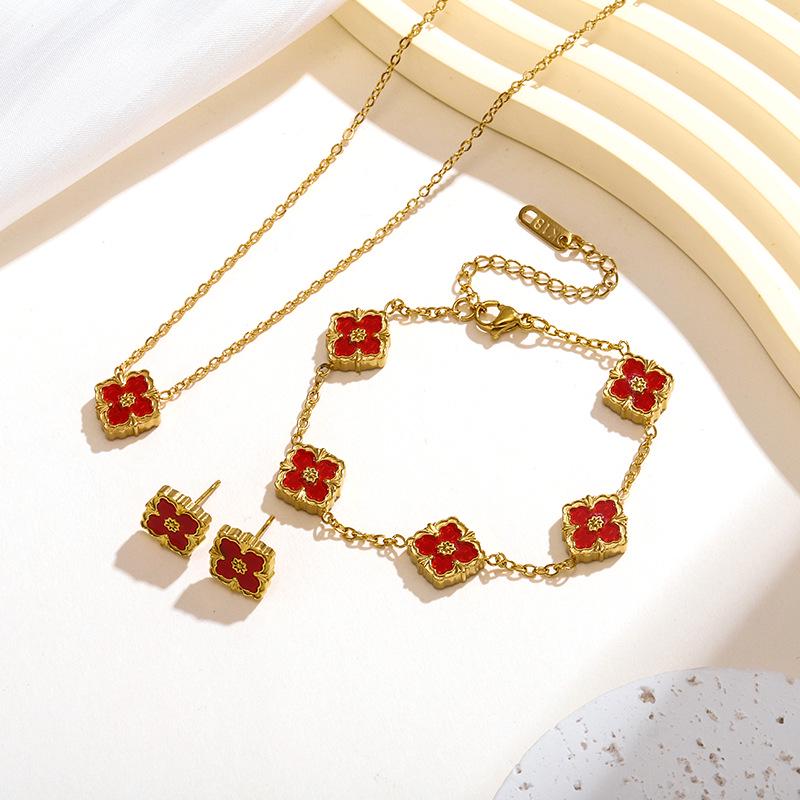 Retro Craftsmanship 18K Titanium Steel Four-Leaf Clover Jewelry Set: Flower Necklace, Bracelet, Earrings.