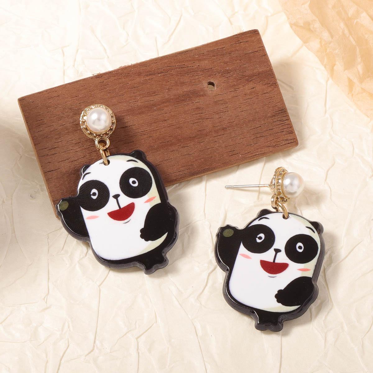 

Fashionable, sweet and cute acrylic sheet imitation pearl bear earrings are versatile and suitable for daily women s wear