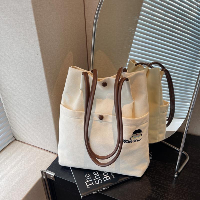 Casual versatile canvas bag women's new light commuter shoulder bag large capacity tote bag