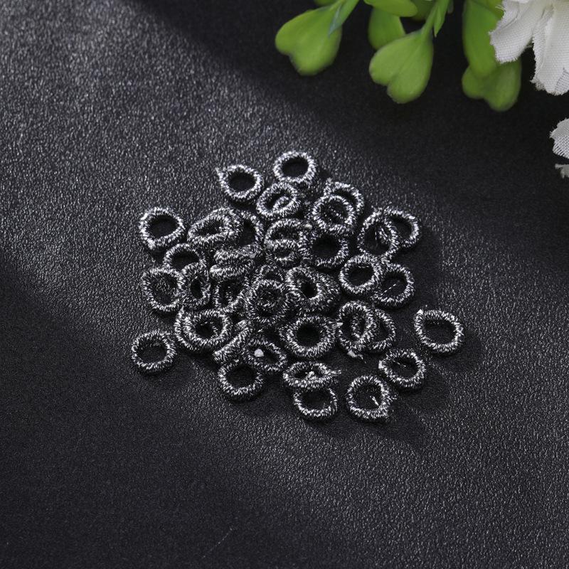 Exquisite Gold Ring with Wire Coil, Gold & Silver Buckle, and Woven Knot Ball