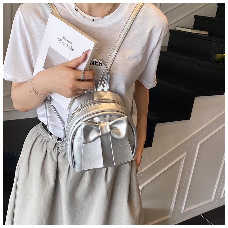 Sac à dos en cuir synthétique style coréen avec nœud papillon pour femme Sac à bandoulière matelassé léger