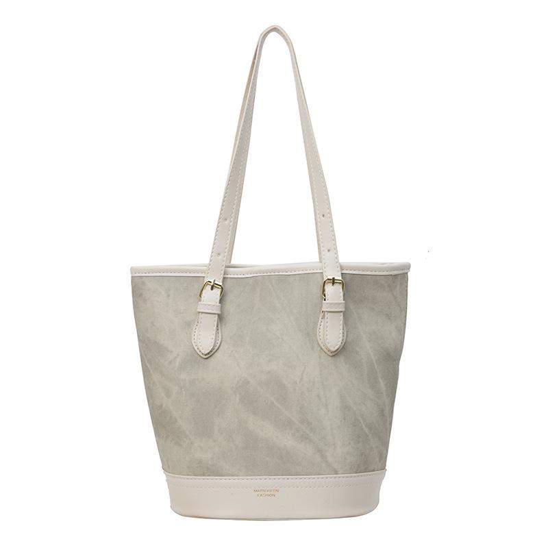 

Модная текстура большой вместимости простая портативная наплечная сумка женская 2025 весна новая универсальная сумка-ведро тренд