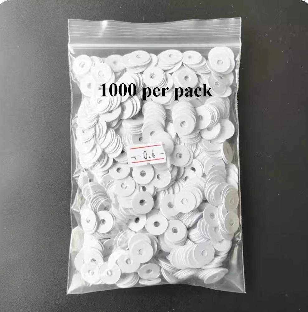 Piano accessories washers, key washers, paper washers, there are 1000 paper washers per pack.