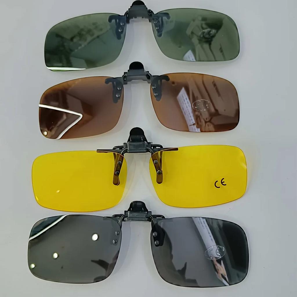 A pair of stylish four-piece flip-on polarized night vision sunglasses with an anti-glare mirror coating, ideal for driving.