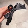 A Black Bow Clipper for Women's Hair, a Popular Hair Clipper At the Back of the Head, and a Shark Clipper Headwear