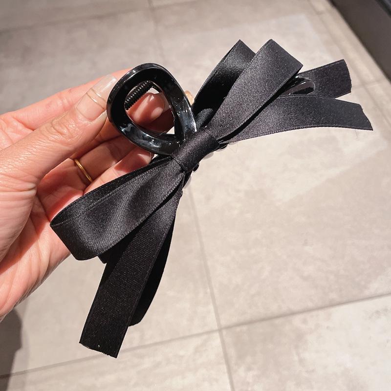 A Black Bow Clipper for Women's Hair, a Popular Hair Clipper At the Back of the Head, and a Shark Clipper Headwear