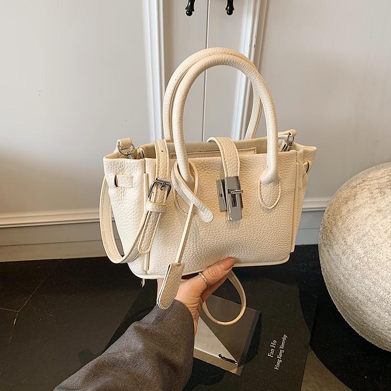 

Весна и лето новая универсальная модная одноплечевая сумка через плечо, повседневная нишевая сумка-ведро с продвинутой текстурой белый