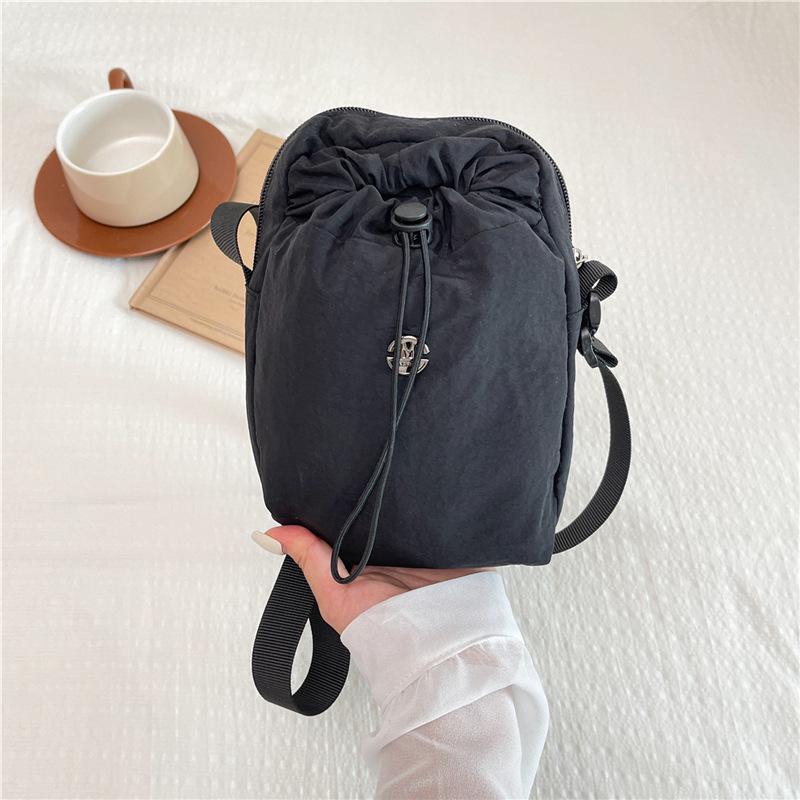 Women's Multi-functional Crossbody Bag: Multi-Compartment, Personalized Water Bottle Holder, Phone Storage, Versatile Travel Backpack.