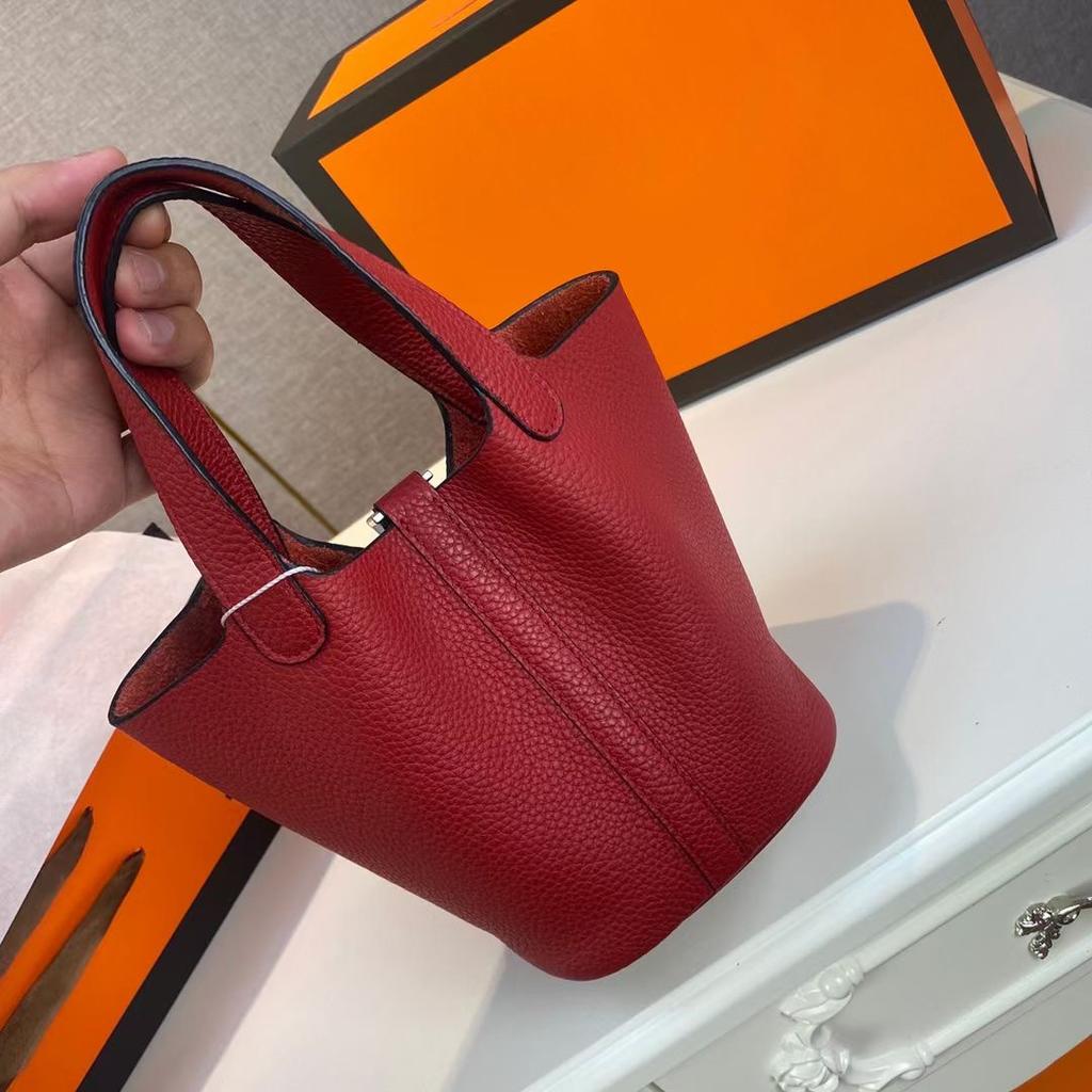 Hochwertige halbhandgefertigte Gemüsekorbtasche togo erste Schicht Rindsleder Pendlertasche echtes Leder tragbare Beuteltasche Damen 18cm