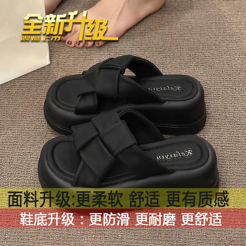

French high-end fashion beach one-word sandals for women s summer wear 2025 new black thick-soled heightening slippers 35