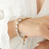 European-Inspired Pig Nose Freshwater Pearl & Titanium Steel Bracelet
