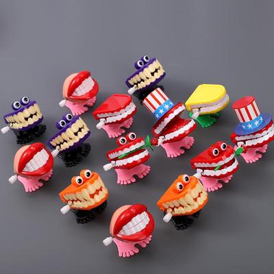 1pcs Clockwork Toy Upper Chain Jumping Tooth Toy Children Jump Teeth Running Clockwork Spring Wind Up Toy