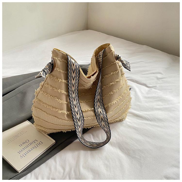 

Large capacity straw bag women s 2025 new summer seaside vacation woven bag ribbon shoulder commuter tote bag хаки