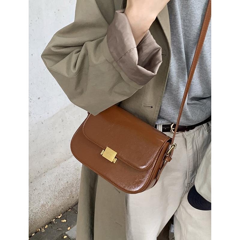 

Retro texture women s small bag 2025 new simple solid color small square bag versatile shoulder messenger bag коричневый
