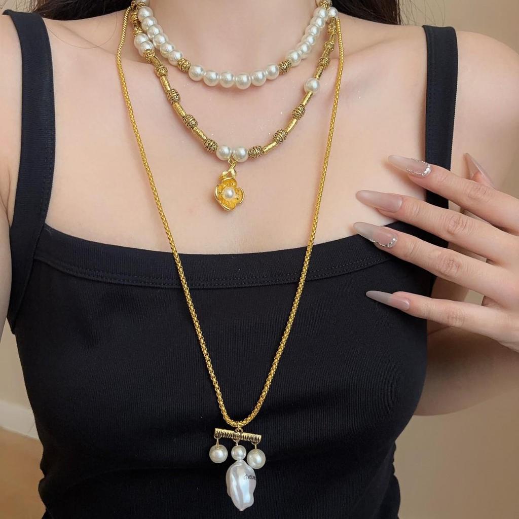 2026 European Retro Stackable Multi-Layer Pearl Necklace: Personalized Sweater Chain for Women