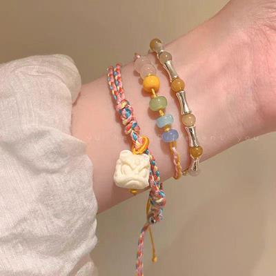 Elegant Bamboo Braided Lion Dance Bracelet - Niche Design, High-End Beaded Jewelry for Women and Students
