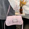 Trend hot-selling locomotive Spice Girl wind rivet design underarm shoulder bag niche design sense commuter versatile messenger bag