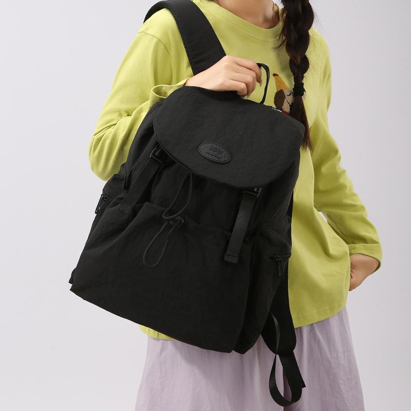 Lightweight backpack women's outdoor camping hiking bag versatile simple casual backpack men and women the same style