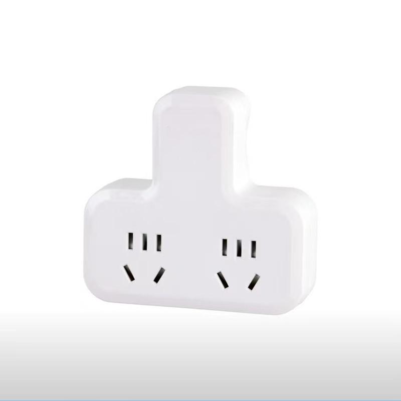 

Компактний USB-адаптер з кількома розетками та синім вимикачем для домашнього використання