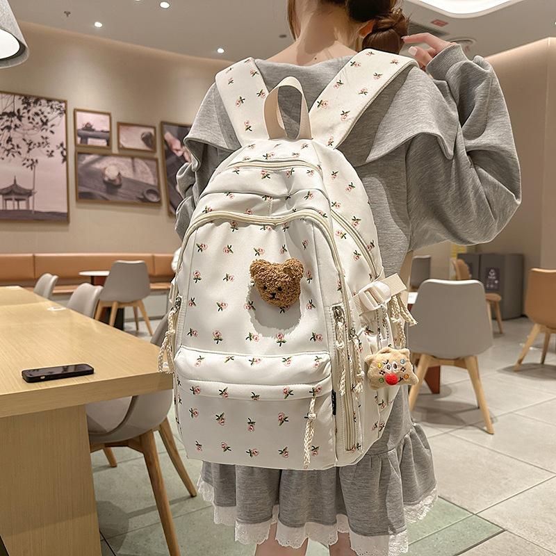 Small fresh schoolbag female college student cute small floral travel backpack lightweight large capacity junior high school student backpack