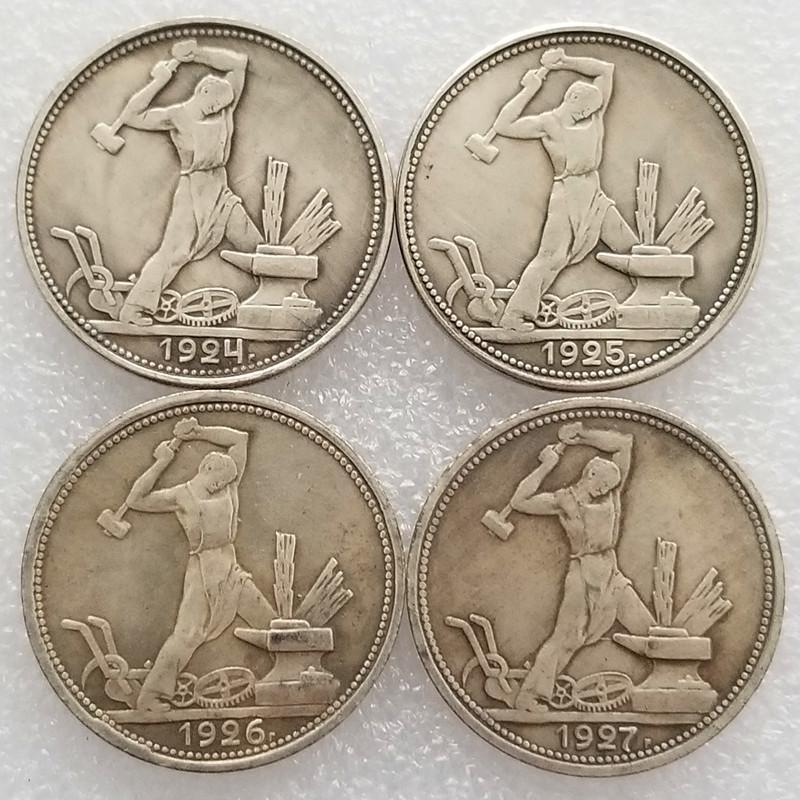 Set of Four Vintage Style Metal Coins Featuring Blacksmith Motif with Hammer and Anvil Design Circa 1924 To 1927 Replica Collectible Coins