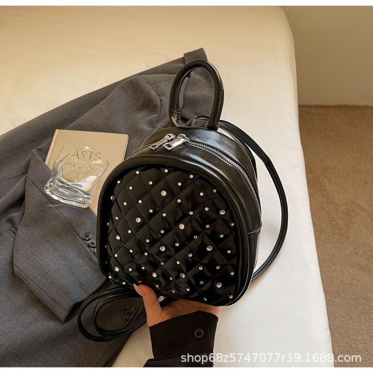 Rivet Backpack Women's 2025 New Fashion Personality Punk Style Lightweight Soft Leather Women's Backpack Casual Travel Bag