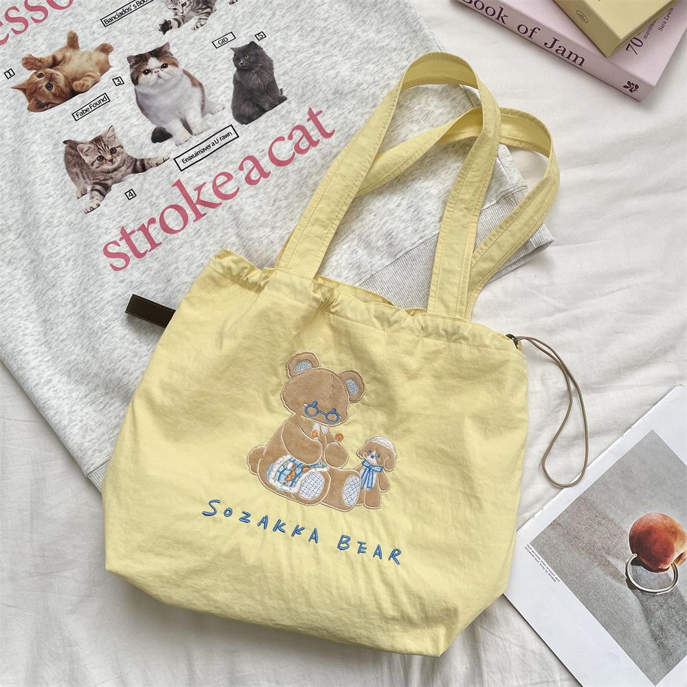 5 cute cartoon embroidered canvas bag large capacity women's simple versatile drawstring bundle single shoulder handbag