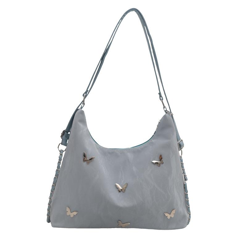 

Жіночий приміський рюкзак у формі метелика великої місткості. Новий тренд 2024 року. Універсальна сумка через плече. Багатофункціональна сумка з косою текстурою. синій