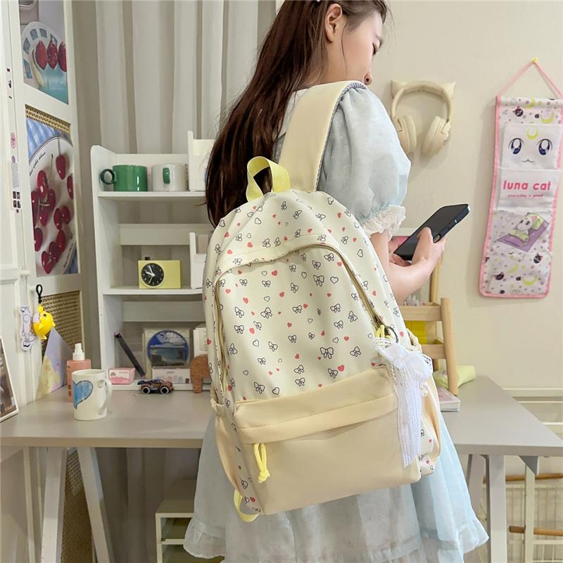 Cute Heart and Bow Print School Backpack with Front Pocket Top Handle Casual Daypack for Girls Students