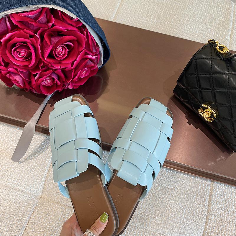 Roman style flat-bottomed slippers 2025 new retro woven straps bag head empty sandals niche soft-soled half slippers
