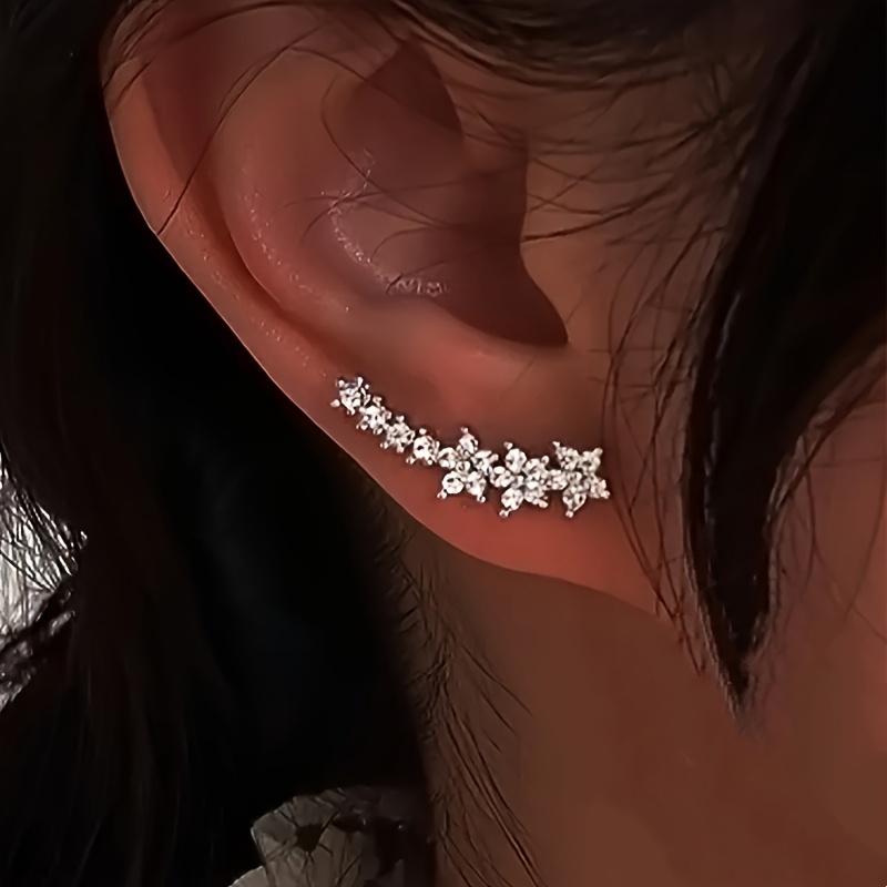 A pair of elegant and luxurious delicate floral stud earrings, fully set with diamonds and rhinestones, perfect as a Thanksgiving gift for women