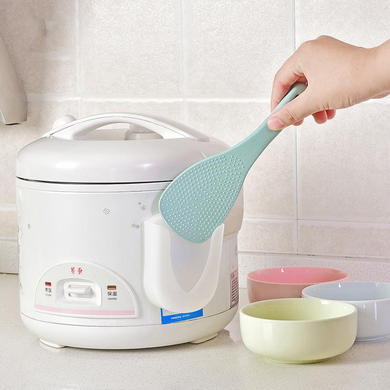 Suction cup type rice spoon holder kitchen plastic spoon rack rice scoop wall hanging shovel rack