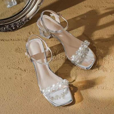 Sommer neue französische Sandalen mit Röcken, kleine hohe Absätze zeigen hohe Perlen-Strasssteine, einfache Ein-Wort-Schnallensandalen Trend