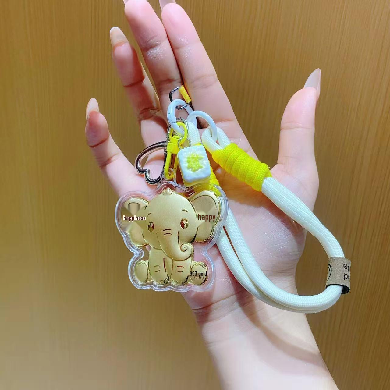 

Adorable Little Elephant Keychain: Perfect Phone Charm, Bag Pendant, Car Ornament, and Holiday Gift for Girlfriend.