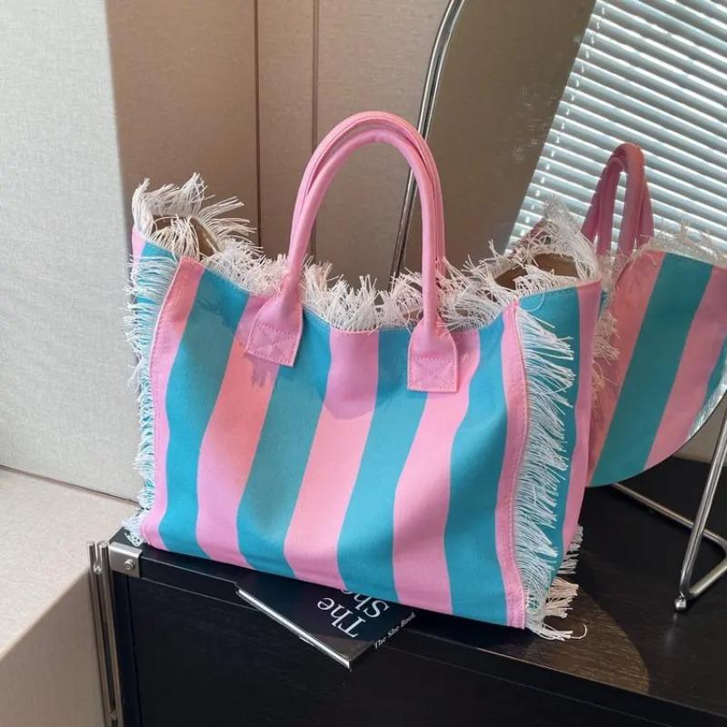 2026 Damen-Tragetasche für Reisen Strandtasche Große Kapazität Schulter-Pendlertaschen Hand-Quaste Jeans-Print Quaste Gespleißte Handtaschen