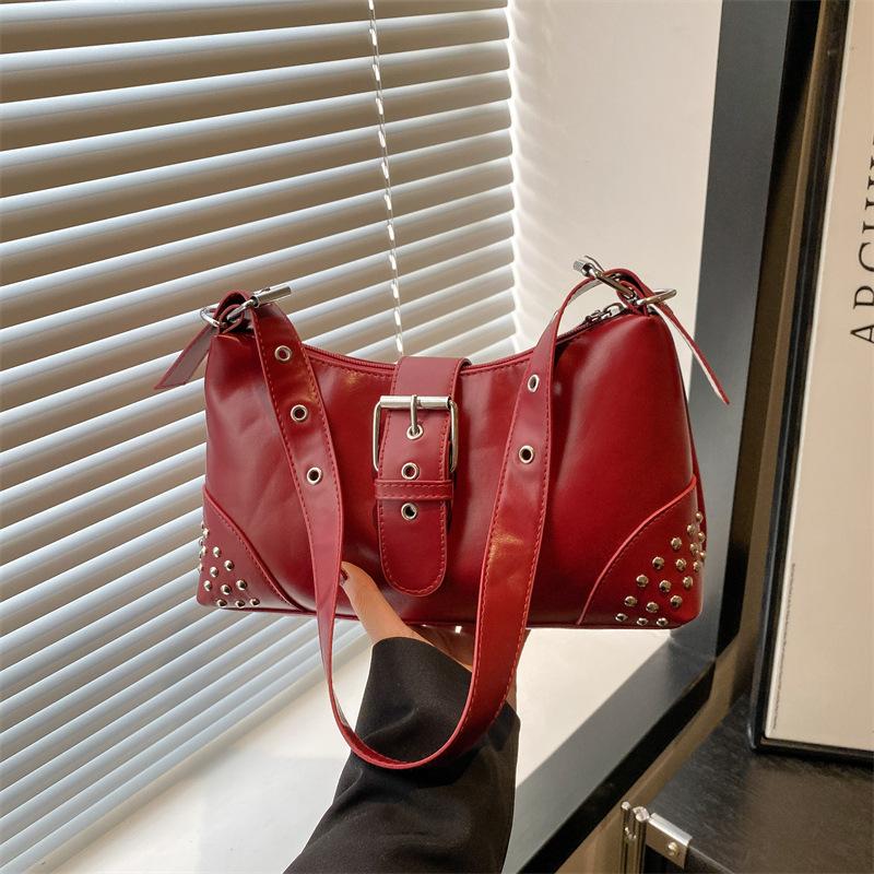 Trendy solid color niche design sense versatile casual summer new portable shoulder armpit bag women's bag