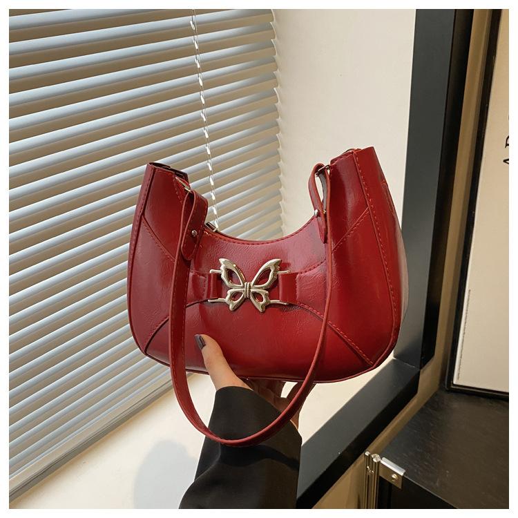 Solid color butterfly summer new fashion simple sweet diagonal across armpit shoulder bag women