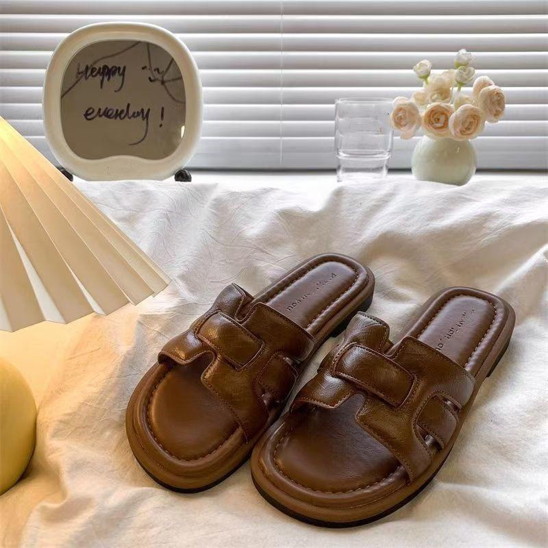 Franska retro cool tofflor med ett ord dam 2025 nya ytterplagg fyrkantig tå vävda muller-skor mjuk sula strandtofflor