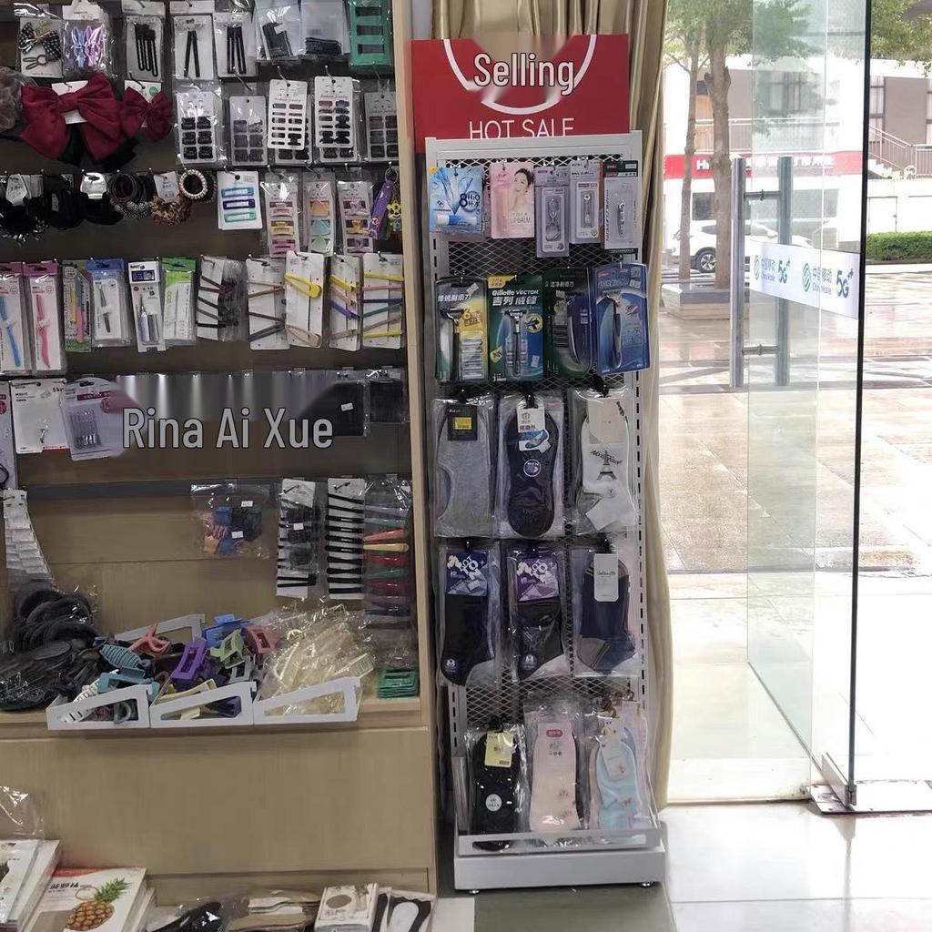 Multi-Use Display Rack with Hooks: Perfect for Spicy Strips, Snacks, Socks, Lip Balm, Toothbrushes, and Small Accessories.