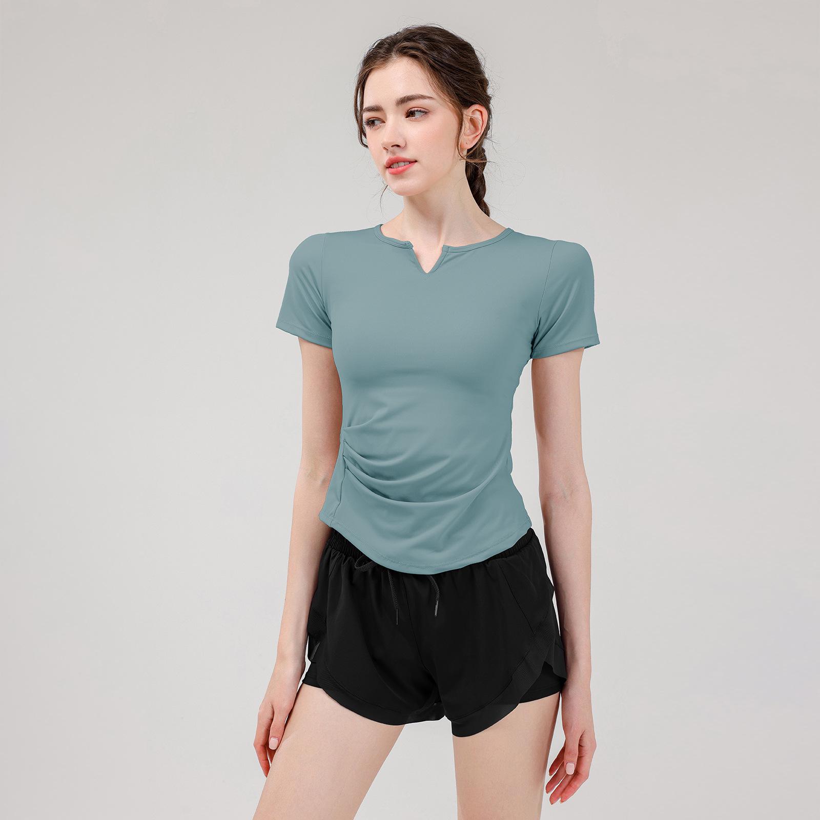 

Женский быстросохнущий костюм с коротким рукавом для йоги и тренировок Medium зелёный/чёрный