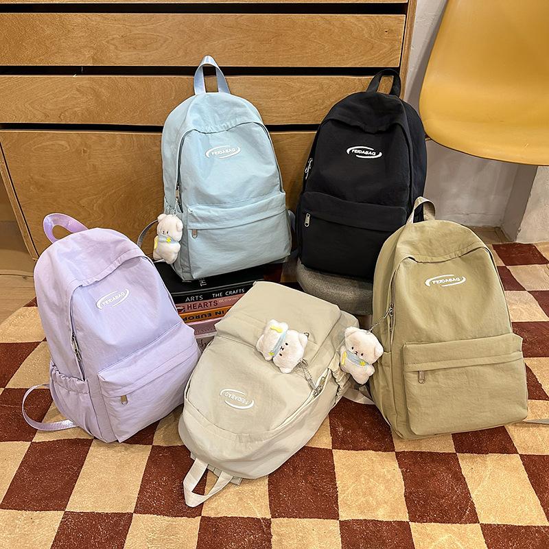 College style schoolbag for girls Junior high school students Simple large-capacity computer backpack Casual high school students Travel backpack tide